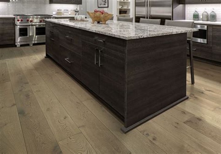 Coordinating wood floor with wood cabinets