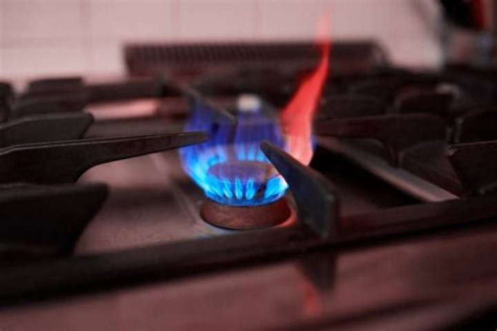 Question: What Causes Red Flame On Gas Stove